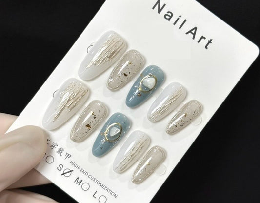 Elegant Almond Press-On Nails – Cream White, Dusty Blue & Gold Foil with Pearl Accent